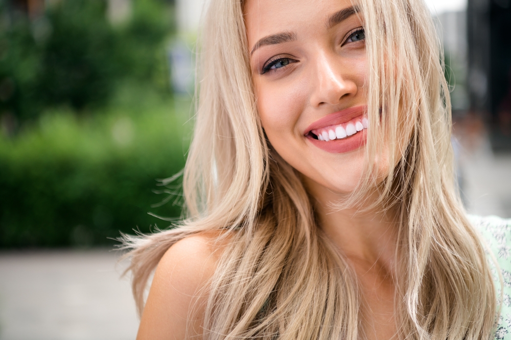 girl smiling. Transform Smiles With Confidence with Veneers